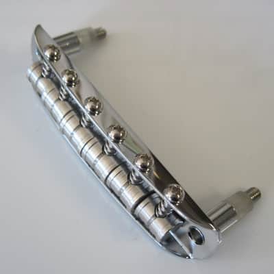 Fender USA Jaguar Jazzmaster Bridge with Mustang Saddles 7.25 Radius 7712971049 image 7