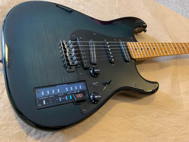 Casio PG-300 Turquioseburst Flame electric guitar with Midi and