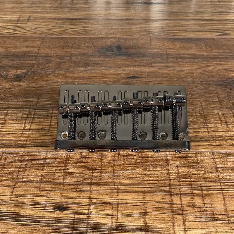 ESP LTD 6 String Bass Bridge Black Chrome Used image 1