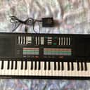 Yamaha PSS-470 two Operator FM synthesizer, with power supply, missing battery door, cleaned 2023