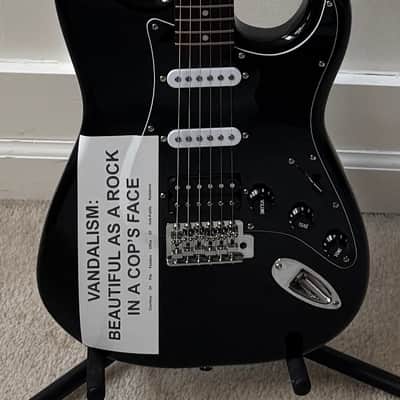 2004 Fender® Squier Kurt Cobain Vandalism Black Stratocaster with Deluxe Gig Bag image 1
