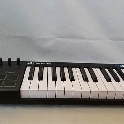 Alesis V25 25-key USB MIDI Controller with Beat Pads 2017 - 2022 - Black image 1