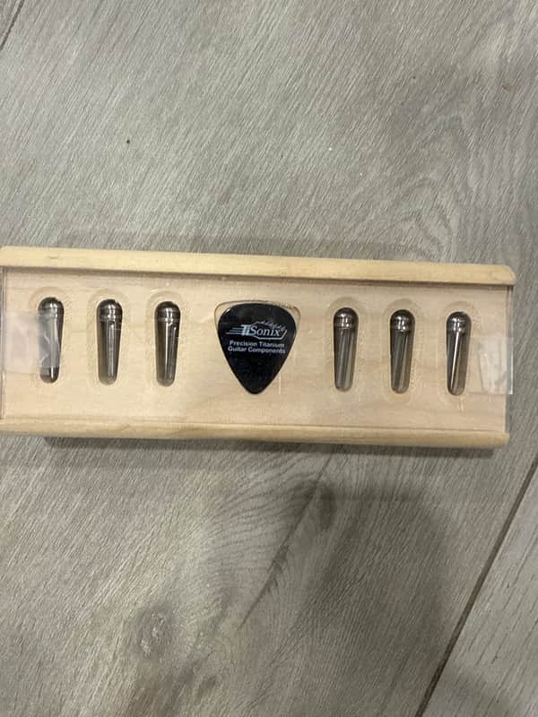 TiSonix Titanium Bridge Pins for Acoustic Guitar - 3DEG-.215 image 1