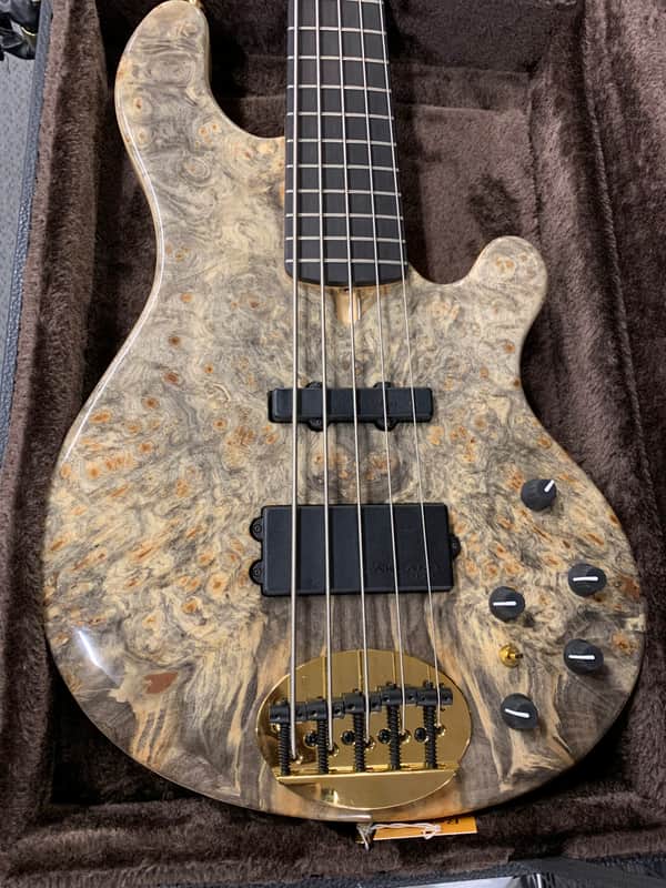 Lakland 55-94 US Custom Deluxe Buckeye Burl over Ash, Ebony Board, Gold Hardware