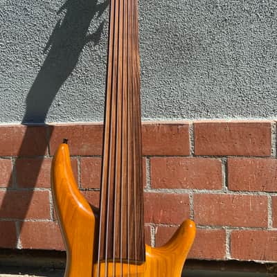 L'Dressy 7-string fretless bass. Mid-2000s - Honey image 11