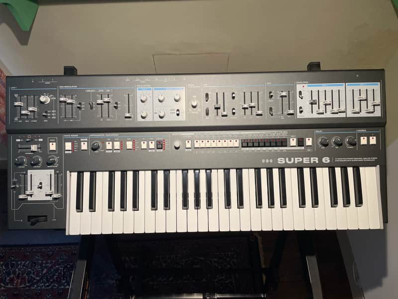 UDO Audio Super 6 12-Voice Polyphonic Binaural Analog-Hybrid Synthesizer with Decksaver and all packaging image 1