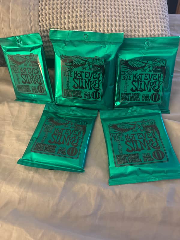 7 packs of Ernie Ball 2626 Not Even Slinky Guitar Strings (12 - 56) NEW image 1