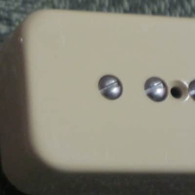 mostly very clean 1990s Gibson P-100 Soapbar pickup with Creme Cover (but can sell with black cover instead) NO mounting screws 6.3k - ideal for NECK position (2 conductor, solder connect) a P100 is a stacked humbucker that's hum-cancelling image 13
