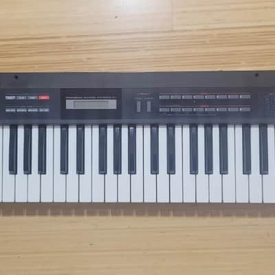 Roland Alpha Juno-1 49-Key Programmable Polyphonic Synthesizer 1985 - 1988 - Black