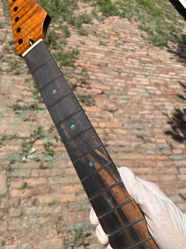 Striped Ebony Fretboard 22frets 5a Roasted flame Maple guitar neck Radius 12inch Round stainless steel 22 frets Roasted flame Maple guitar neck Striped Ebony fingerboard 25.5inch hole 10mm Radius: 12 inches. image 1