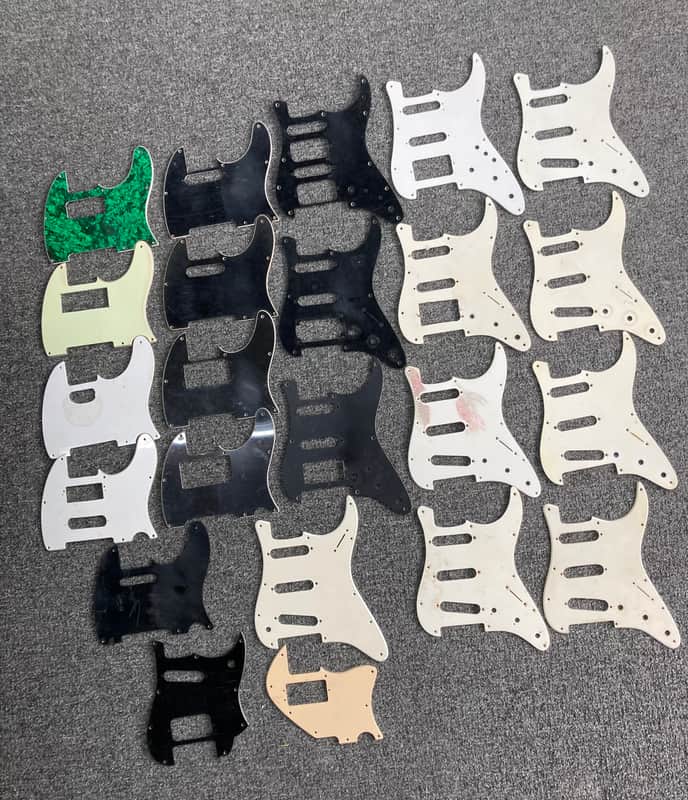 Unknown Lot of 23 misc. Strat/Tele Pickguards - Black/White/Mint/Green/Cream etc. image 1
