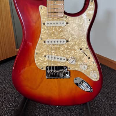 Fender American Deluxe Stratocaster with Maple Fretboard 2002 - 2003 - Aged Cherry Burst image 1