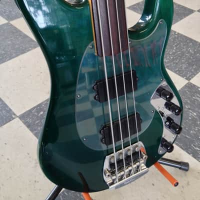 1985 1986 Music Man Sabre Unlined Fretless Trans Green image 1