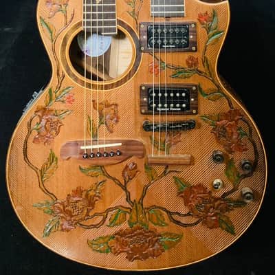 GIBSON SJ-200 EC CUTAWAY WITH PICKUP. ANTIQUE NATURAL. FLAMED WOOD