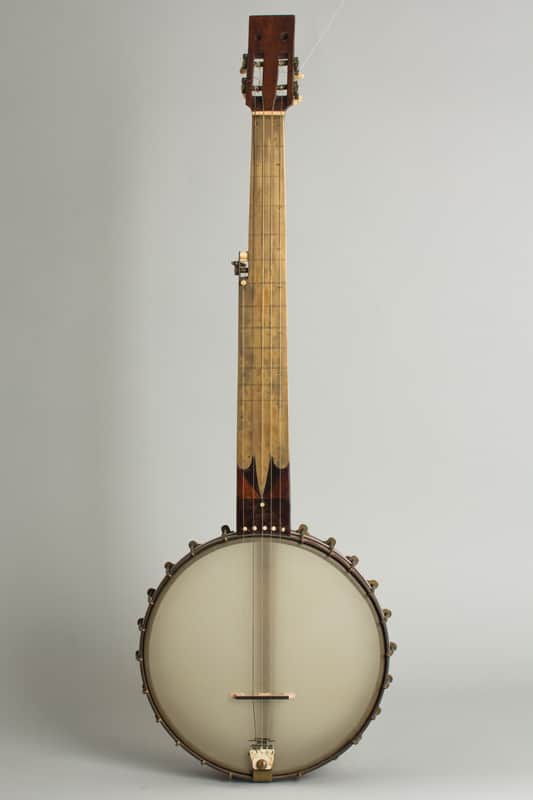 Minstrel Banjo (maker unknown), c. 1870, original black coffin case. image 1
