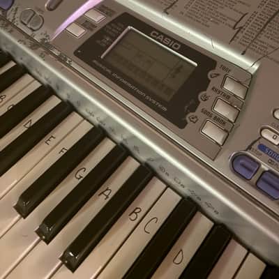 Casio CTK-496 100 Song Bank Keyboard MIDI Jacks & Mic Mix In & AC Adapter - Silver