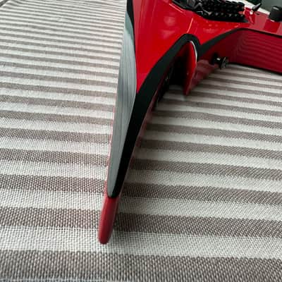 Jackson Pro Series Phil Demmel Signature Demmelition Pro King V, NOS condition, NECK-THRU construction, Floyd Rose Tremolo, Active EMG pickups, RED with BLACK BEVELS, with OEM Jackson FLYING V Hardshell Case, original accessories image 12