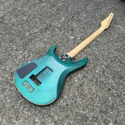 Sidewalk Sale: Washburn Mercury Series Electric Guitar Husk (1990s - Teal Flake) image 11
