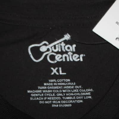 new in package A+ Guitar Center EAT BREATHE, ROCK Men's Size X-Large (XL), Black 100% Cotton Short Sleeve T-Shirt - Graphic is in White and it says / shows: GUITAR CENTER EST. 1964, EAT, BREATHE, ROCK + has dual guitars, stars, lines (Style # GC005-11730) image 2