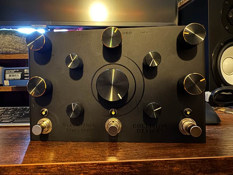 Collision Devices Black Hole Symmetry