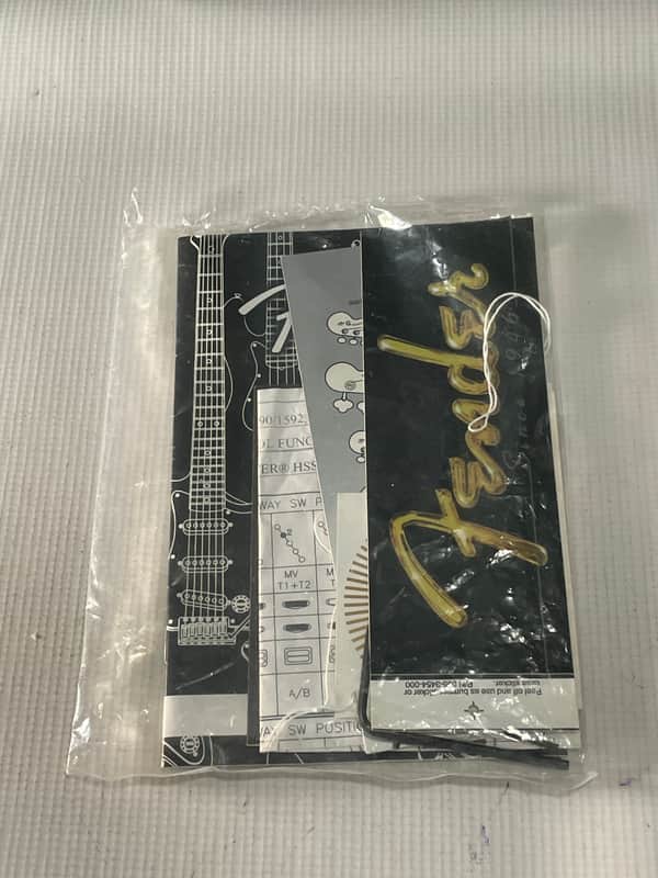 2000's Fender Deluxe Stratocaster Guitar Warranty Brochures, Bumper Stickers, Case Candy, etc. image 1