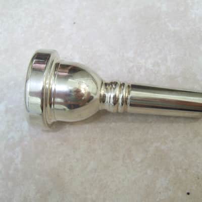Silver trombone mouthpiece. Large shank image 1