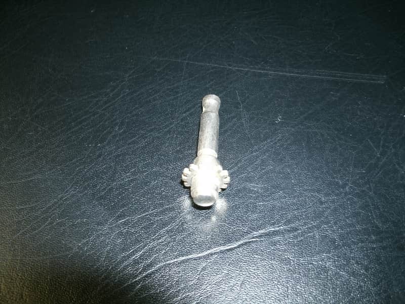 60's original NOS Danelectro Silvertone "skate key" tuner string shaft with gear. You get one. image 1