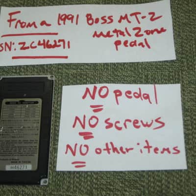 used medium relic'd genuine Boss Bottom Plate (Silver Label Taiwan) for compact (regular) size pedal, from March 1991 - PLATE PART: Metal w/ Silver Finish / BOTTOM LABEL: SLT / EXTERIOR PADDING: Black stiff hardened rubber - NO: pedal/screws/other items image 1