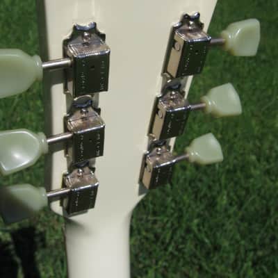 White MIJ Photogenic SG with Gibson deluxe tuners and open book