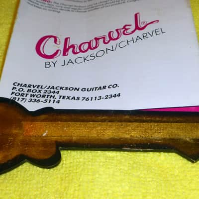 Charvel Pack consisting of Charvel Owners Manual from 1990 and Metal Charvel Guitar Case Badge Very Cool image 5