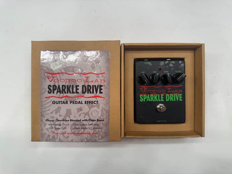 Blue and black guitar effects pedal with knobs and "Voodoo Lab Sparkle Drive" text.