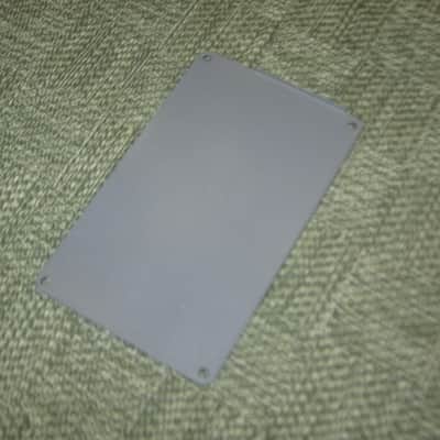 used vintage DOD Performer Series BOTTOM PLATE ( screw holes are on 4 corner areas) NO: pedal/other parts - early 1980s - Metal Plate has Silver & Gray Finish / Stiff Black Rubber Padding (padding has ridges) has Label, underside sanded & repainted gray image 14