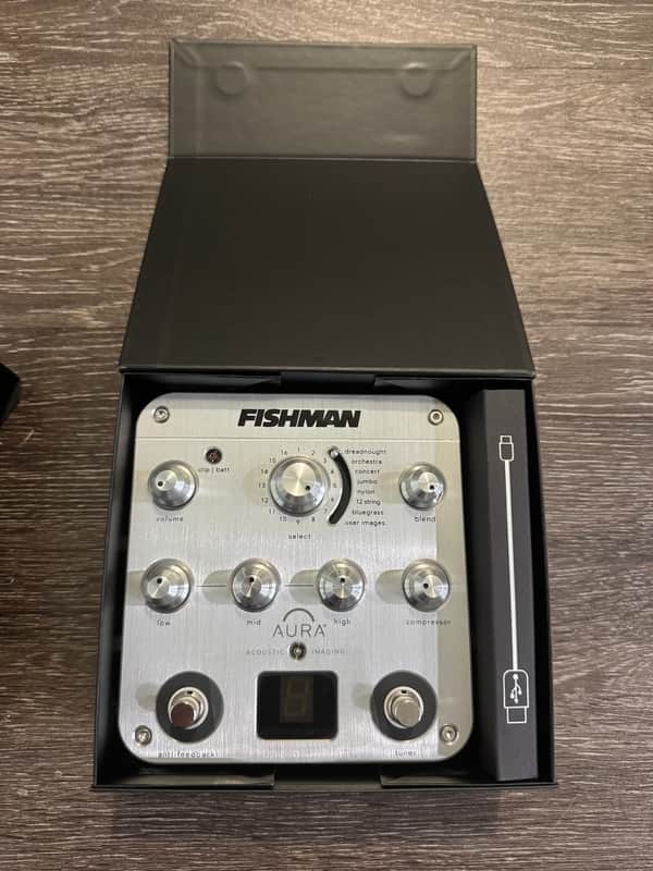 White Fishman Aura Acoustic Imaging preamp with knobs and digital display.