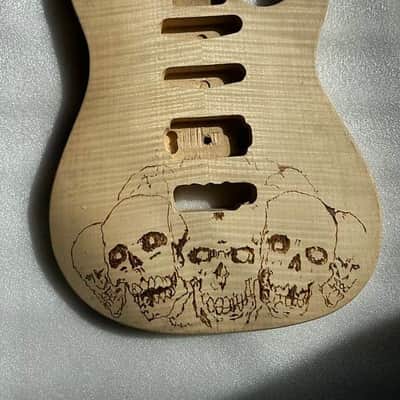 Carved Skull Head Top HSS Guitar Basswood Body with Tiger Maple Top