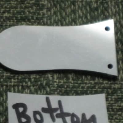open package (near A+) unknown brand Epiphone 3 Hole Truss Rod Cover, blank (NO info), 2 ply (black front side / white bevelled edge, & white back side), bell shape + silver screws (TOP SIDE of cover has clear plastic over it), from 2020s image 6