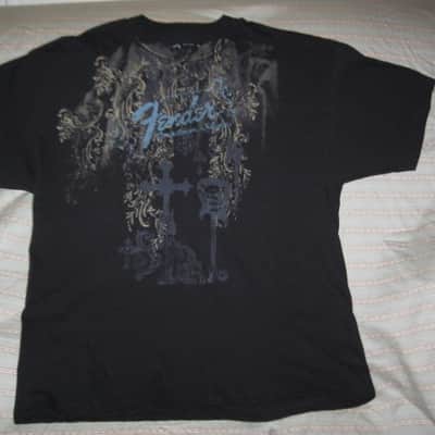 new old stock genuine Fender Heaven's Gate Custom Shop 100% Cotton Black Short Sleeve T-Shirt, XXL (XX-Large) (part #): 9101040806, early 2010s, GRAPHIC: Tan, Blue, Brown, Black (cross, 2 guitars, floral swirl, Fender, Custom Shop) NO: hang tag/packaging image 8