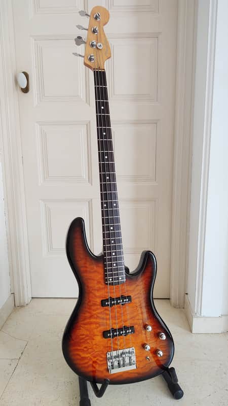 Fender Jazz Bass Deluxe Series 24 Fret MIK Korea Cherry Sunburst, Quilted Maple top.   90's Sunburst image 1