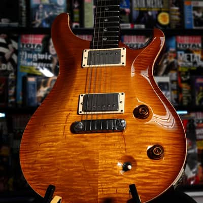 with a Flame Maple top, Mahogany neck with a Wide-Fat profile, East Indian Rosewood fretboard with moon inlays, Straight stoptail bridge, McCarty treble and bass pickups, finished in McCarty Sunburst, with nickel hardware. image 2