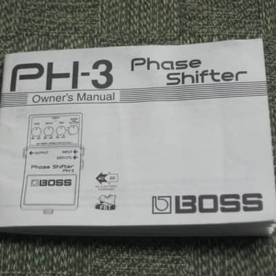used (less than lite average wear) genuine Boss Owner's Manual for PH-3 Phase Shifter (NO: pedal / other items) 2000s (copyright year 2002) white matte paper / black print & graphic [5 inches across (unopened), 3 & 1/2 inches high] 32 pages cover to cover image 1