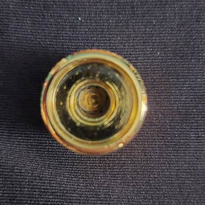 Gold and black tone knob with screw image 4