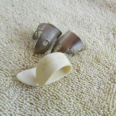 2 Dunlop .0225 Fingerpicks & National Thumbpick Good Used Condition National Thumbpick And 2 Metal Fingerpicks image 1