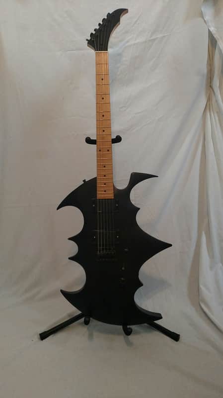 Trinity Bat-el'-ax image 1