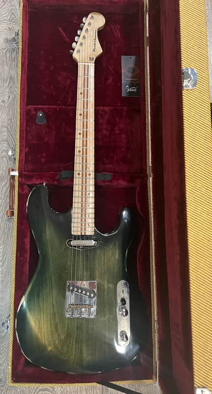 Wanderkauven Electric guitar - Transparent green burst finish with visible wood grain image 1