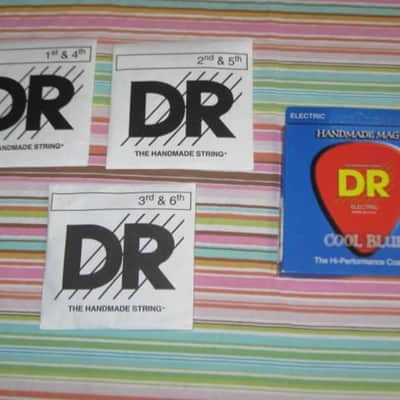 ONE SET new in packaging (old stock) DR CBE-9 (9-42) COOL BLUE electric guitar strings (9, 11, 16, 24,32, 42) "The High Performance Coating" Blue coated electric guitar strings on a hexagonal core + 2 extra gauge 9 strings (1 Elixir & 1 D'Addario) image 4