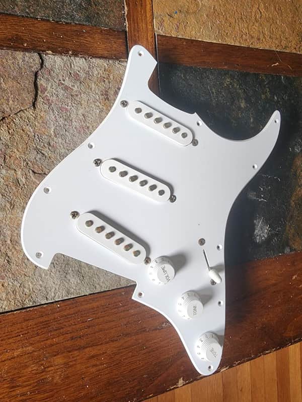 Squier loaded strat pickguard assembly SSS 2000s - white image 1