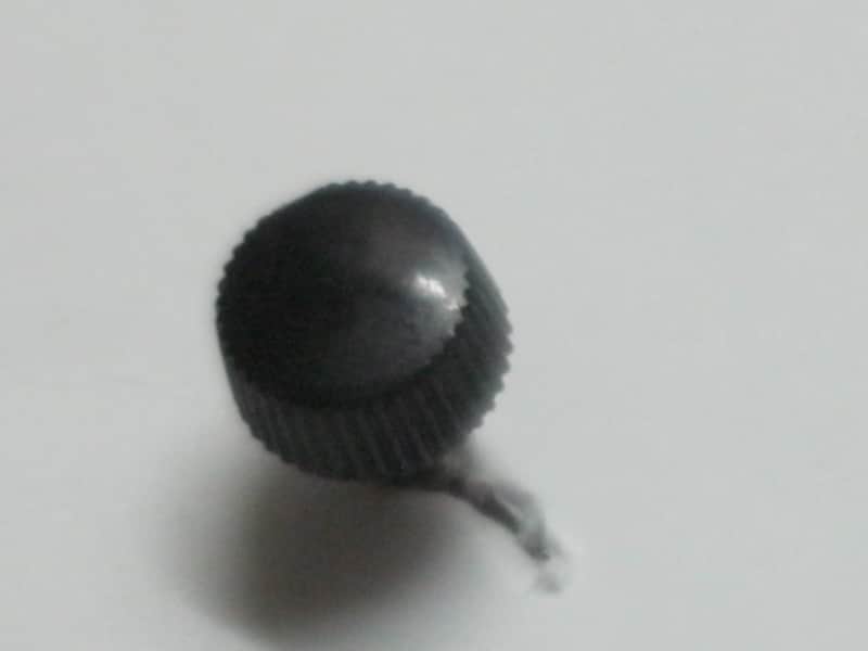 ONE used genuine Boss thumb screw (black hard plastic head) 1990s -2010s - HEAD: Black hard plastic- Top Side has light surface cloudiness, outer sides are ribbed - have some tiny nicks /  threaded shaft is silver color metal (but has discoloration) image 1