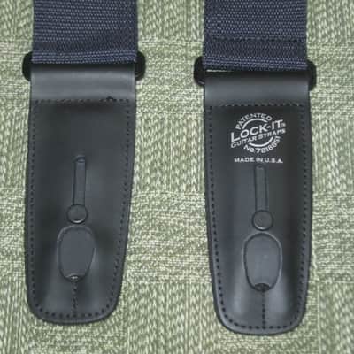very lightly used Lock-It LIS-001-P2-BLK POLY PRO SERIES Black 2" guitar strap (2" wide, black polypropylene material, patented and brilliant Lock-It strap locking system, leather ends) straps, extend to an extra long 62" in max length image 2