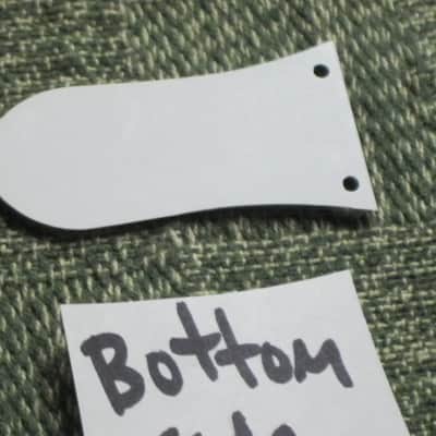open package (near A+) unknown brand Epiphone 3 Hole Truss Rod Cover, blank (NO info), 2 ply (black front side / white bevelled edge, & white back side), bell shape + silver screws (TOP SIDE of cover has clear plastic over it), from 2020s image 21
