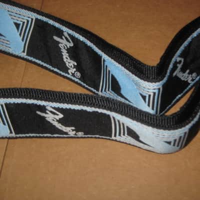 new with tags genuine Fender 2" Monogrammed Guitar Strap Black, Light Gray, and Light Blue - Fender part number: 099-0681-502, Fully adjustable length (39"-72") Woven Fender logo and guitar headstock design, polyester backing, black leather ends image 19