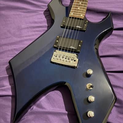 B.C. Rich Platinum Series Warlock 1998 – Transparent Blue (Widow Headstock) – Professionally Set Up – RoadRunner Premium Gig Bag Included image 1